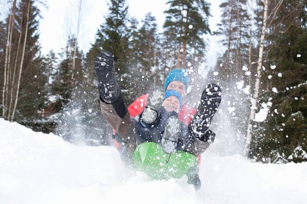 Man and son on speeding toboggan in snow covered forest, 13.11.2017, Copyright: xTiinax&xGeirx, model released, wearing,front view,three quarter length,childhood,carefree,exhilaration,fun,innocence,nurturing,sharing,togetherness,happiness,love,getting away from it all,on the go,tree,fir tree,frozen,40 to 44 years,child,caucasian ethnicity,male,boy,man,mature man,two people,europe,finland,outdoors,rural,forest,winter,day,boot,glove,knit hat,anorak,winter clothing,sitting on lap,smiling,son,father,single parent,lifestyle,speed,leisure,travel,vacation,snow,powder snow,family with one child,moving down,toboggan,4 to 5 years,only male,waterproof clothing,downhill,snow covered,male bonding,November 2017 Release,pusula,Sitting,Lap,Caucasian Eth Ref:IS09B9B45