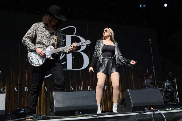 Country music singer Gabby Barrett (right) and Cade Foehner perform on stage during the iHeartRadio Music Festival Daytime Concerts at Area15 in Las Vegas, Nevada on Saturday, September 18, 2021.  LAV2021091868 JAMESxATOA