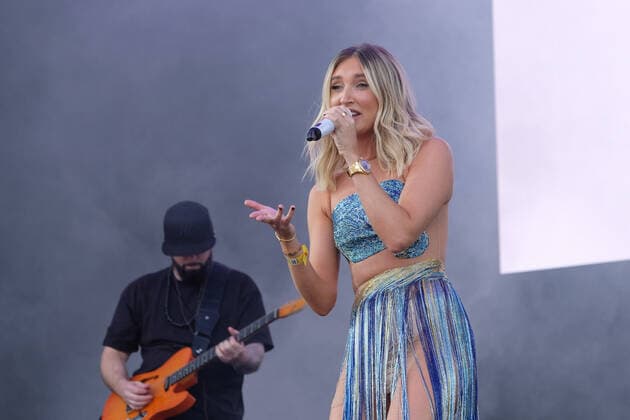 September 19, 2021, Newport, United Kingdom: English television personality and singer, songwriter Megan Elizabeth McKenna, who appeared on reality TV shows Celebrity Big Brother and The Only Way Is Essex performs live on stage at the Isle of Wight festival. Newport United Kingdom - ZUMAs197 20210919_zaa_s197_173 Copyright: xDawnxFletcher-Parkx