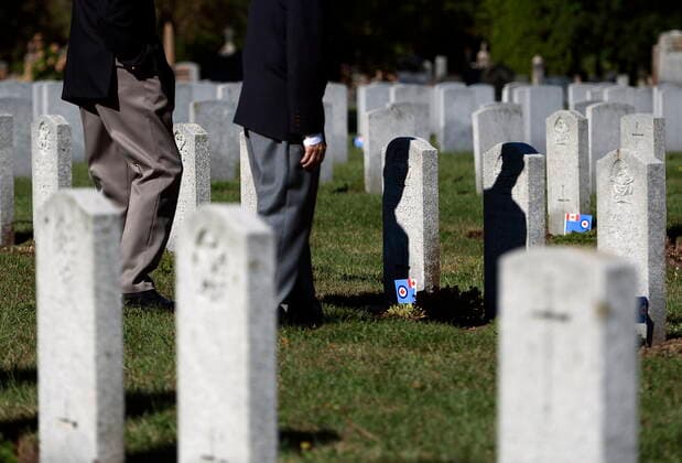 September 19, 2021, Ottawa, ON, CAN: Veterans walk among gravestones marked with the RCAF flag, indicating veterans who served during the era of the Battle of Britain, during a ceremony marking its 81st anniversary at Beechwood National Military Cemetery, in Ottawa, on Sunday, Sept. 19, 2021. Ottawa CAN - ZUMAc35_ 20210919_zaf_c35_016 Copyright: xJustinxTangx