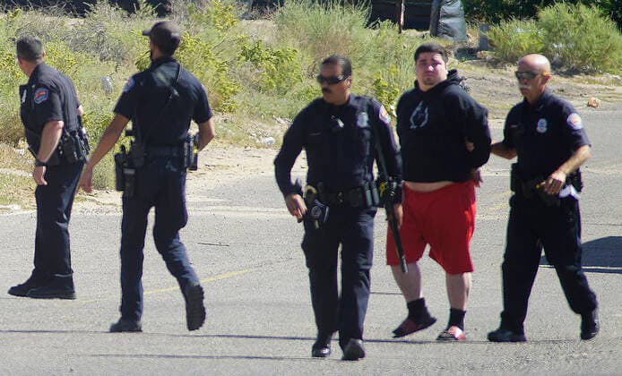 September 19, 2021, NEW MEXICO, USA: 091921.APD take a suspect into custody after a homeless man shot and killed at Central and 98th Street . Photographed on Sunday September 19, 2021. USA - ZUMAab1_ 20210919_zaf_ab1_004 Copyright: xAdolphexPierre-Louis Journalx