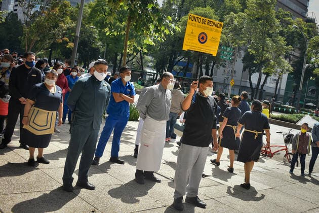September 19, 2021, Mexico City, Mexico: Business workers from the Reforma Avenue participate in the National Earthquake Drill. .With a simulated scenario of a 7.2-degree earthquake with an epicenter in Acatlan de Osorio, Puebla, the Second National Drill 2021 was carried out, in commemoration of the 36th anniversary of the 1985 earthquake and the one that occurred in 2017. Mexico City Mexico - ZUMAs197 20210919_zaa_s197_335 Copyright: xGuillermoxDiazx