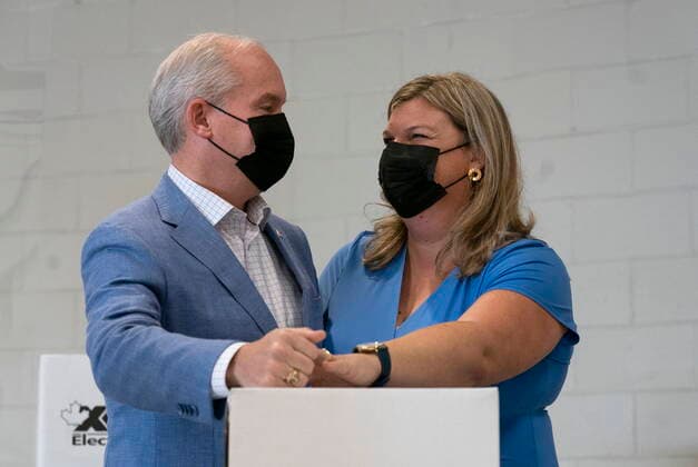 September 20, 2021, Bowmanville, on, Canada: Rebecca OÃ¢â‚¬â ¢Toole holds her husbands hand after she and Conservative leader Erin O Toole cast their ballot in the federal election Monday, September 20, 2021 in Bowmanville, Ontario. Bowmanville Canada  - ZUMAc35_ 20210920_zaf_c35_020 Copyright: xAdrianxWyldx