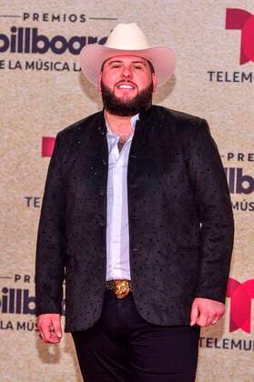 Mexican singer El Fantasma poses on the red carpet at the Billboard Latin Music Awards, at the Watsco Center in Miami, Florida, USA, 23 September 2021. According to the organizers, the Billboard Latin Music Awards recognize the most popular albums, songs and performers in Latin music, based on the results of actual sales, streaming, radio broadcasts and social networks that provide information to the weekly Billboard charts. for a year. Red carpet of the 2021 Billboard Latin Music Awards in Miami !ACHTUNG: NUR REDAKTIONELLE NUTZUNG!  Copyright: xGiorgioxVierax USA1952 20210924-b6737de95e7b292f7f80695dc4878a3f34fbc76f