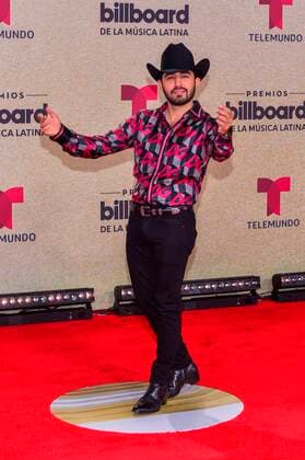 Mexican singer Joss Favela poses on the red carpet at the Billboard Latin Music Awards, at the Watsco Center in Miami, Florida, USA, 23 September 2021. According to the organizers, the Billboard Latin Music Awards recognize the most popular albums, songs and performers in Latin music, based on the results of actual sales, streaming, radio broadcasts and social networks that provide information to the weekly Billboard charts. for a year. Red carpet of the 2021 Billboard Latin Music Awards in Miami !ACHTUNG: NUR REDAKTIONELLE NUTZUNG!  Copyright: xGiorgioxVierax USA2055 20210924-0bded32ff50ec33345ffb3e9ee2cc0c0b67cb599