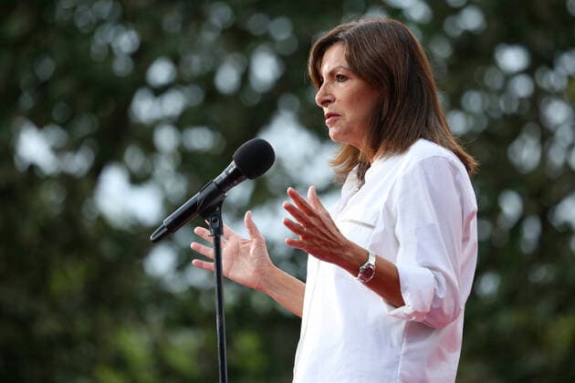 Paris Mayor Anne Hidalgo speaks to the crowd before the start of the Global Citizen Live concert in Paris on Saturday, September 25, 2021. The concert, held at the base of the Eiffel Tower, is one of several taking place in cities around the world including New York, Los Angeles, London, Sydney, Lagos, Rio, Mumbai and Seoul. The event aims to raise awareness for issues related to the climate and ending poverty. PAR20210925005 DAVIDxSILPA