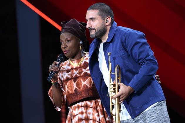 Angelique Kidjo (L) and Ibrahim Maalouf perform during the Global Citizen Live concert in Paris on Saturday, September 25, 2021. The concert, held at the base of the Eiffel Tower, is one of several taking place in cities around the world including New York, Los Angeles, London, Sydney, Lagos, Rio, Mumbai and Seoul. The event aims to raise awareness for issues related to the climate and ending poverty. PARI20210925013 DAVIDxSILPA