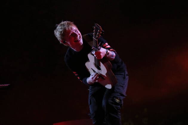 Ed Sheeran performs during the Global Citizen Live concert in Paris on Saturday, September 25, 2021. The concert, held at the base of the Eiffel Tower, is one of several taking place in cities around the world including New York, Los Angeles, London, Sydney, Lagos, Rio, Mumbai and Seoul. The event aims to raise awareness for issues related to the climate and ending poverty. PARI20210925057 DAVIDxSILPA