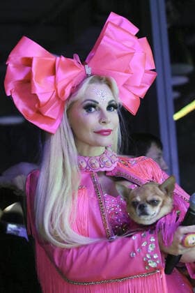 MOSCOW, RUSSIA â€“ SEPTEMBER 28, 2021: Blogger Tanya Tuzova with a dog at a ceremony to present the 2021 Golden Pet Awards at the Federation Tower of the Moscow International Business Centre. Vladimir Gerdo TASS  TS1125A5