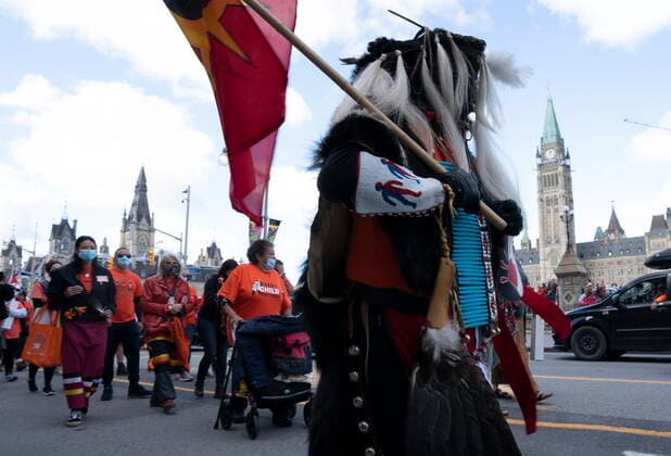 September 30, 2021, Ottawa, on, Canada: Residential school survivors, elders and family members lead the march following following National Day for Truth and Reconciliation ceremonies on Parliament Hill, Thursday, September 30, 2021 in Ottawa. Ottawa Canada  - ZUMAc35_ 20210930_zaf_c35_031 Copyright: xAdrianxWyldx