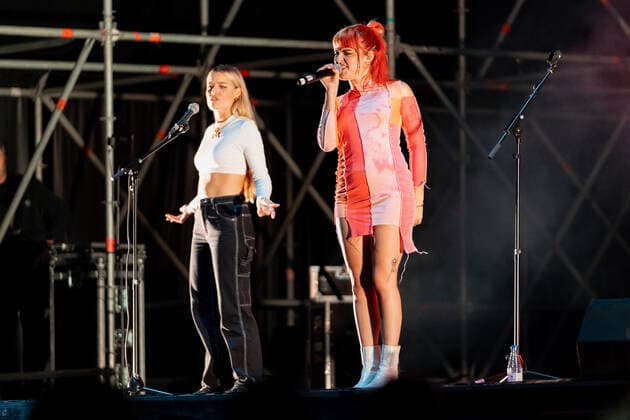 September 30, 2021, Valencia, Spain: Marina Martinez Reche sister of Alba Reche (L), together with Alba Martinez Reche, better known as Alba Reche (R), perform on stage during a concert at La Marina in Valencia..Alba MartÃanez Reche is a Spanish singer-songwriter, composer and artist. She became known by participating in the TVE talent contest, Operacion Triunfo 2018, being part of its tenth edition and being in the second position. Valencia Spain - ZUMAs197 20210930_zaa_s197_251 Copyright: xXiscoxNavarrox