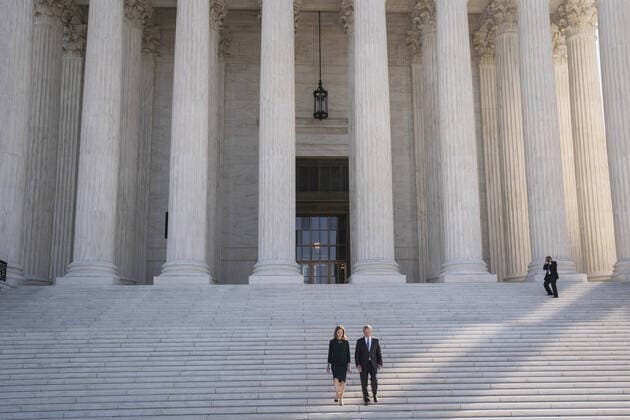 Supreme Court Justice Amy Coney Barrett and Chief Justice of the Supreme Court John Roberts participate in a photo-op outside of the Supreme Court of the United States following a investiture ceremony in Washington, DC on Friday October 1, 2021.  WAP20211001511 SARAHxSILBIGER
