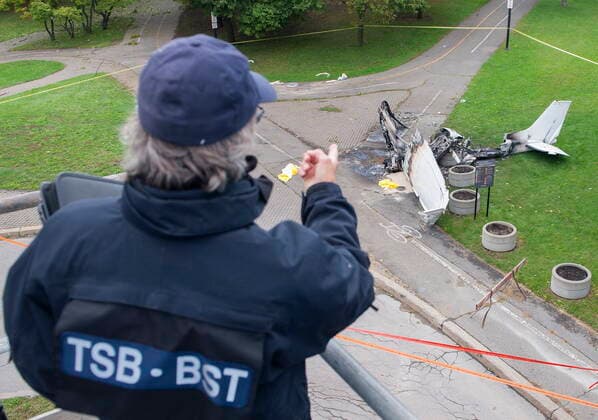 October 3, 2021, Montreal, PQ, Canada: Pierre Gavillet, Regional Senior Investigator with the Transportation Safety Board (TSB) points to the wreckage of a plane at a crash site in Montreal, Sunday, Oct. 3, 2021. The small plane crashed on Ile Sainte-Helene near MontrealÃ¢â‚¬â ¢s Old Port on Saturday. Montreal Canada  - ZUMAc35_ 20211003_zaf_c35_007 Copyright: xGrahamxHughesx