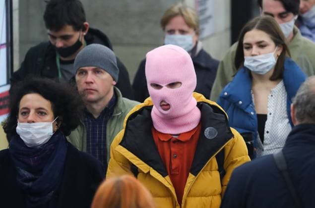 ST PETERSBURG, RUSSIA â€“ OCTOBER 6, 2021: A man wearing a balaclava at Tekhnologichesky Institut station of the St Petersburg Underground during a morning rush hour. Over the past 24 hours, 25,133 new cases of COVID-19 have been confirmed in Russia; for 5 days in a row more than 25,000 news cases of COVID-19 are being confirmed in Russia. Peter Kovalev TASS  TS1133E4
