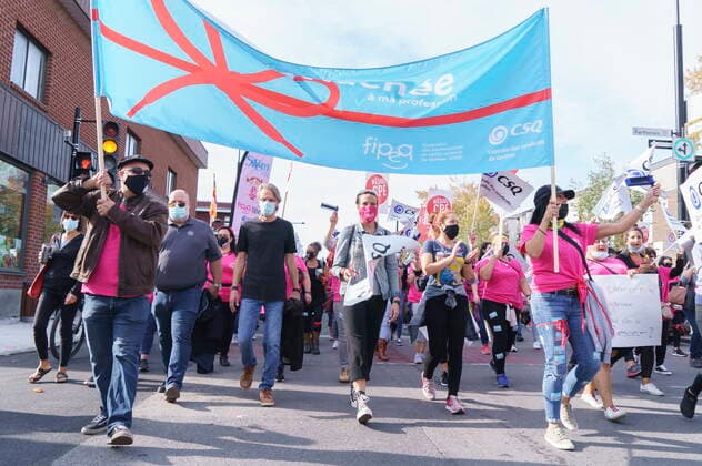 October 12, 2021, Montreal, PQ, Canada: Daycare workers demonstrate on the first day of rotating strikes in Montreal on Tuesday, October 12, 2021. Montreal Canada  - ZUMAc35_ 20211012_zaf_c35_006 Copyright: xPaulxChiassonx