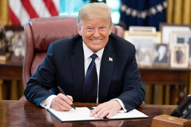 President Donald Trump smiles into the camera as he signs a memorandum supporting the US Lobster Industry, June 24, 2020. It extended USDA subsidies to support fisherman against the impact of recent Chinese tariffs imposed in 2018 (BSLOC_2020_5_3) PUBLICATIONXNOTxINxCANxCHNxFRAxITAxJPNxNORxPOLxRUSxESPxUKxUSA