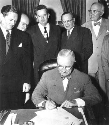 President Harry Truman signs the American Housing Act of 1949, on July 12, 1949. The law provided federal aid to assist slum-clearance projects, low-rent public housing projects, and farm housing (BSLOC_2021_3_32) PUBLICATIONXNOTxINxCANxCHNxFRAxITAxJPNxNORxPOLxRUSxESPxUKxUSA