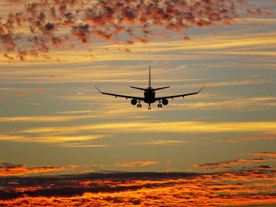 September 7, 2021, Richmond, British Columbia, Canada: A Delta Connection Embraer E175LR jet (N305SY), operated by SkyWest Airlines, lands at sunset, Vancouver International Airport. Richmond Canada - ZUMAs202 20210907_zap_s202_028 Copyright: xBaynexStanleyx