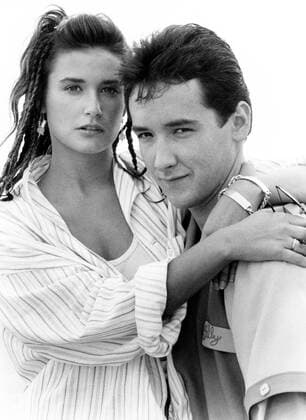 ONE CRAZY SUMMER, from left, Demi Moore, John Cusack, 1986. ?Warner Bros. courtesy Everett Collection Ref:MBDONCR WB001 PUBLICATIONXNOTxINxCANxCHNxFRAxITAxJPNxNORxPOLxRUSxESPxUKxUSA Copyright: xx MBDONCR WB001