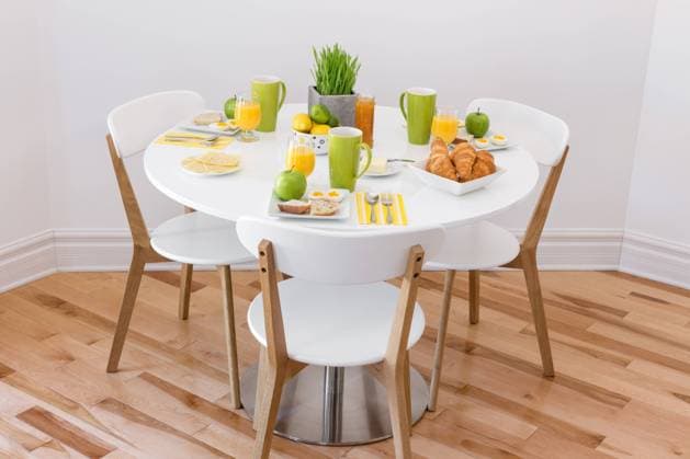 Elegant round table with tasty breakfast for three. Copyright: x@xGoodMoodPhotox 8487332
