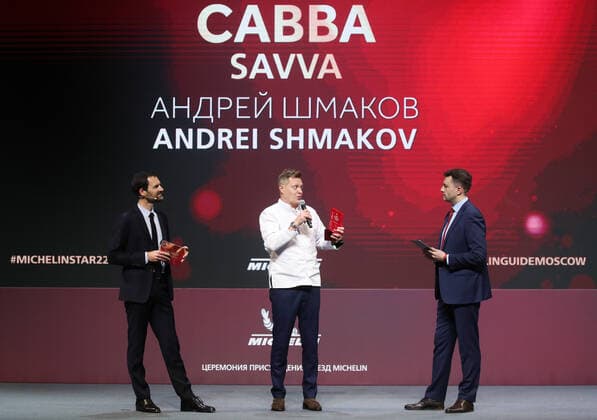 MOSCOW, RUSSIA - OCTOBER 14, 2021: Michelin Guides International Director Gwendal Poullennec, Savva chef Andrei Shmakov, and journalist Sergei Krasnov (L-R) attend a ceremony held at the Zaryadye Concert Hall to award Michelin stars to Moscow restaurants and chefs as well as to introduce the first Michelin Guide to Moscow. Vyacheslav Prokofyev TASS  TS1143D3
