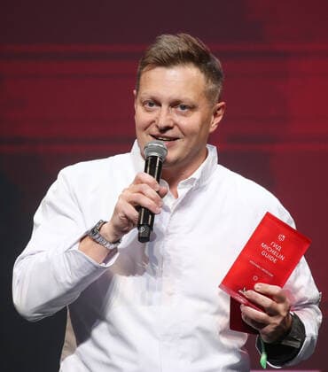 MOSCOW, RUSSIA - OCTOBER 14, 2021: Savva chef Andrei Shmakov speaks during a ceremony held at the Zaryadye Concert Hall to award Michelin stars to Moscow restaurants and chefs as well as to introduce the first Michelin Guide to Moscow. Vyacheslav Prokofyev TASS  TS1143D4