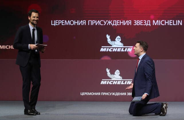 MOSCOW, RUSSIA - OCTOBER 14, 2021: Michelin Guides International Director Gwendal Poullennec (L) and journalist Sergei Krasnov attend a ceremony held at the Zaryadye Concert Hall to award Michelin stars to Moscow restaurants and chefs as well as to introduce the first Michelin Guide to Moscow. Vyacheslav Prokofyev TASS  TS1143D5