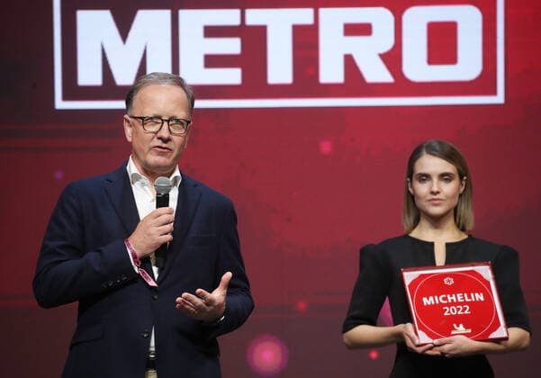MOSCOW, RUSSIA - OCTOBER 14, 2021: Metro Cash & Carry Russia CEO Martin Schumacher (L) speaks during a ceremony held at the Zaryadye Concert Hall to award Michelin stars to Moscow restaurants and chefs as well as to introduce the first Michelin Guide to Moscow. Vyacheslav Prokofyev TASS  TS1143E8