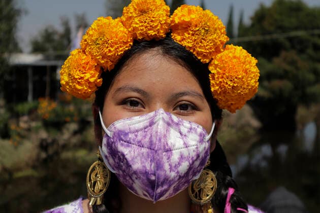Sale Of Cempasuchitl Flower Begins In Xochimilco, Mexico City Representative of the Most Beautiful Flower of the Ejido inside the Acuexcomatl Market in San Luis Tlaxialtemalco, Mexico City, prior to the inauguration of the sale of Cempasuchitl flower during the sanitary emergency by COVID-19 and the epidemiological traffic light in the capital on the eve of the Day of the Dead festivities in Mexico on November 1 and 2. Mexico City Mexico vieyra-notitle211014_npHGh  Copyright: xGerardoxVieyrax
