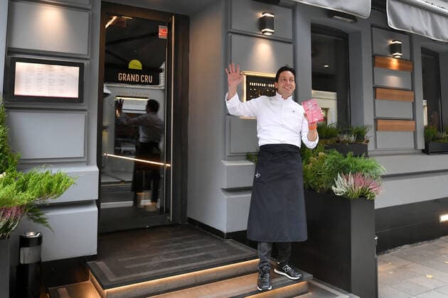 MOSCOW, RUSSIA - OCTOBER 16, 2021: Chef David Hemmerle poses with the trophy at the Grand Cru restaurant awarded a Michelin star. Maxim Grigoryev TASS  TS114600