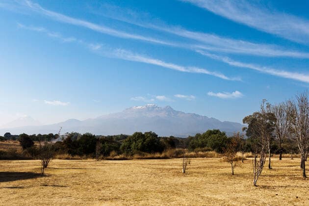 Popocatepetl volcano and blue sky in Mexico Copyright: xDmitryxRukhlenkox 4233816