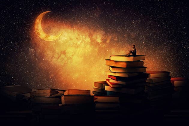 Boy sitting alone on a pile of books, looking a the new moon. Magic night scene. In search of knowlegde concept. Copyright: xx 24476520