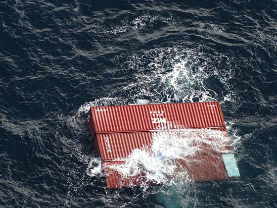 STYLELOCATIONCommercial cargo containers floating in the Strait of Juan de Fuca after falling off the MV ZIM Kingston cargo October 23, 2021 near Victoria, British Columbia, Canada. The shipping containers were carrying potassium amylxanthate which ignited causing a fire onboard the vessel. Victoria Canada - ZUMAp138 20211023_zaa_p138_004 Copyright: xPo3xDiolandaxCaballero U.S.xCoasx