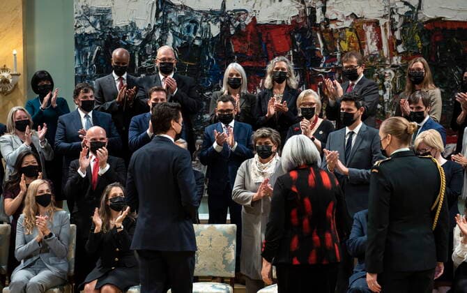October 26, 2021, Ottawa, ON, CAN: Prime Minister Justin Trudeau and Gov. Gen. Mary May Simon are applauded by members of the federal cabinet as they arrive for a photo after a swearing in ceremony at Rideau Hall in Ottawa, on Tuesday, Oct. 26, 2021. Ottawa CAN  - ZUMAc35_ 20211026_zaf_c35_164 Copyright: xJustinxTangx
