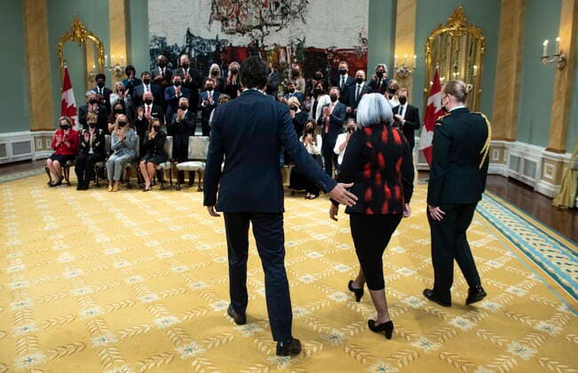 October 26, 2021, Ottawa, ON, CAN: Prime Minister Justin Trudeau and Gov. Gen. Mary May Simon, right, arrive for a group photo with members of the federal cabinet after a swearing in ceremony at Rideau Hall in Ottawa, on Tuesday, Oct. 26, 2021. Ottawa CAN  - ZUMAc35_ 20211026_zaf_c35_167 Copyright: xJustinxTangx