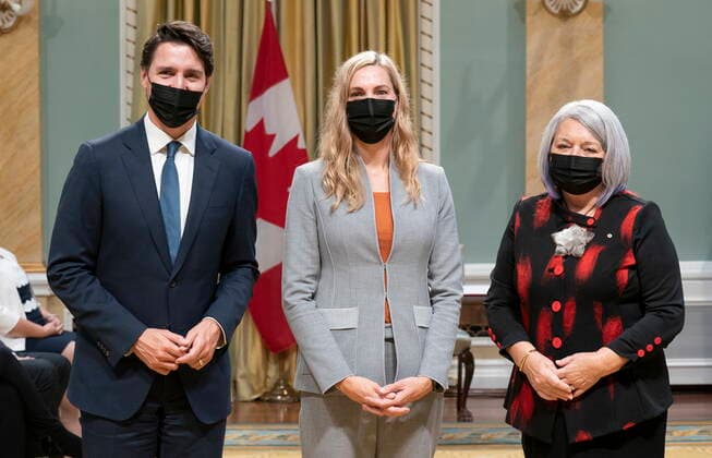 October 26, 2021, Ottawa, ON, Canada: Canadian Prime Minister Justin Trudeau stands with Gov.Gen. Mary May Simon and Pascale St-Onge after she was sworn in as the Minister of Sport and Minister responsible for the Economic Development Agency of Canada for the Regions of Quebec during a swearing-in ceremony at Rideau Hall, Tuesday, October 26, 2021 in Ottawa. Ottawa Canada  - ZUMAc35_ 20211026_zaf_c35_171 Copyright: xAdrianxWyldx