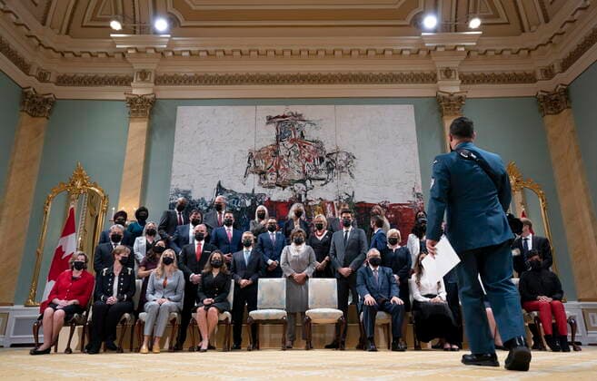 October 26, 2021, Ottawa, ON, Canada: A military photographer arranges new Ministers of the Cabinet for a family photo as they wait for Canadian Prime Minister Justin Trudeau and Gov.Gen. Mary May Simon following a ceremony at Rideau Hall, Tuesday, October 26, 2021 in Ottawa. Ottawa Canada  - ZUMAc35_ 20211026_zaf_c35_172 Copyright: xAdrianxWyldx