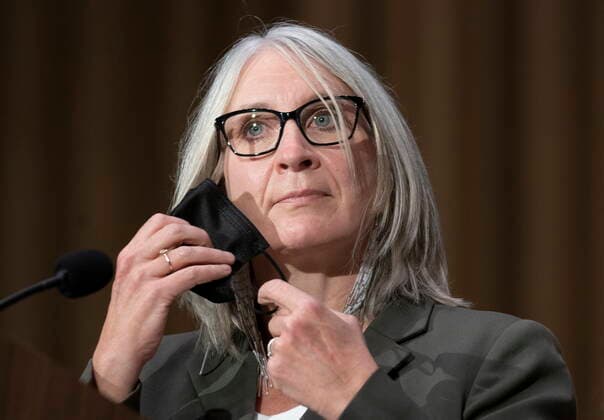 October 26, 2021, Ottawa, ON, Canada: Minister of Indigenous Services Patty Hajdu removes her mask before responding to a question at a news conference, Tuesday, October 26, 2021 in Ottawa. Ottawa Canada  - ZUMAc35_ 20211026_zaf_c35_304 Copyright: xAdrianxWyldx