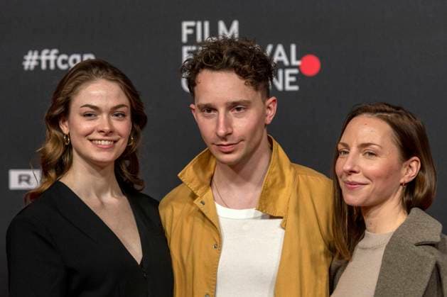 Film Festival Cologne Cologne 21 to 28 October 2021 actor Jonathan Berlin, between actresses Pauline RÃ nevier left and Katharina Schüttler on the occasion of the Film Festival Cologne 2021 at the Filmpalast zu Köln on the red carpet Cologne North Rhine Westphalia Germany
