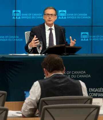 October 27, 2021, Ottawa, on, Canada: A reporter listens to Bank of Canada Governor Tiff Macklem as he speaks during a news conference, in Ottawa, Wednesday, Oct. 27, 2021. Ottawa Canada  - ZUMAc35_ 20211027_zaf_c35_043 Copyright: xAdrianxWyldx