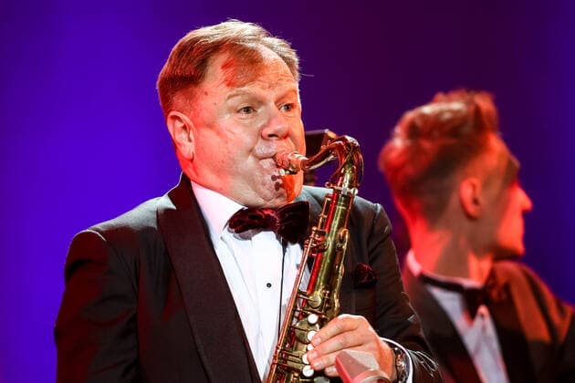 MOSCOW, RUSSIA - OCTOBER 27, 2021: Russian jazz saxophonist Igor Butman performs with the Jazz at Lincoln Center Orchestra during a gala concert marking his 60th birthday at the State Kremlin Palace. The concert is held in the COVID-free format. Valery Sharifulin TASS  TS115F6D