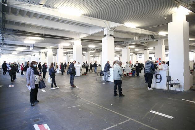 PXL_Vaccinations People are waiting in the line for vaccinations against the coronavirus disease (COVID-19) at Zagreb Fair, in Zagreb, Croatia, on October 28, 2021. MatijaxHabljak PIXSELL