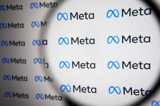 Facebook Renames Itself To Meta Meta Platforms Inc. logo is pictured through a magnifying glass in this illustrative photo taken in Kyiv on 29 October, 2021. Facebook renames itself to new company brand Meta, Chief of Facebook Mark Zuckerberg said on 28 October 2021. Kyiv Ukraine  Copyright: xSTRx sindeyev-notitle211029_npDhI