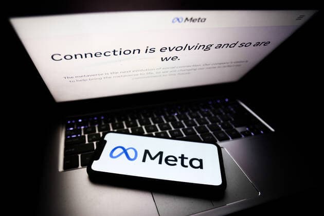 Meta Announced As The New Name Of Facebook Company Meta website displayed on a laptop screen and Meta logo displayed on a phone screen are seen in this illustration photo taken in Krakow, Poland on October 28, 2021. Mark Zuckerberg announced during Facebook Connect event that the new name of Facebook company will be Meta Krakow Poland  Copyright: xJakubxPorzyckix porzycki-metaanno211028_npxwj