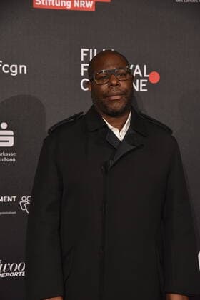British director Sir Steve McQueen arrives at Film Festival Cologne Awards ceremony