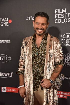 Actor Gianni Jovanovic arrives at Film Festival Cologne Awards ceremony
