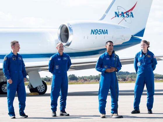 October 26, 2021, Cape Canaveral, Florida, USA: NASA astronaut Raja Chari, second from right, speaks to members of the media after arriving from Houston at the Launch and Landing Facility at NASA™s Kennedy Space Center with fellow NASA astronauts Tom Marshburn, second from left and Kayla Barron, right, and ESA (European Space Agency) astronaut Matthias Maurer, left, ahead of SpaceX™s Crew-3 mission, Tuesday, Oct. 26, 2021, in Florida. NASA™s SpaceX Crew-3 mission is the third crew rotation mission of the SpaceX Crew Dragon spacecraft and Falcon 9 rocket to the International Space Station as part of the agency™s Commercial Crew Program. Chari, Marshburn, Barron, Maurer are scheduled to launch at Oct. 31 at 2:21 a.m. ET, from Launch C - ZUMAs152 20211026_zaa_s152_121 Copyright: xJoelxKowskyx