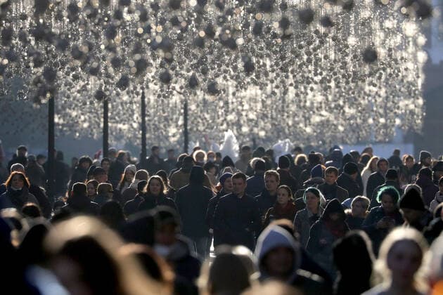 MOSCOW, RUSSIA - OCTOBER 31, 2021: People walk in Moscow s Nikolskaya Street. Moscow has introduced non-working days from October 28 to November 7 to prevent the spread of the novel coronavirus. Sergei Fadeichev TASS  TS116654