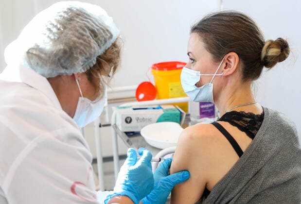 MOSCOW, RUSSIA â€“ NOVEMBER 1, 2021: A COVID-19 mobile vaccination site at the GUM department store. From October 28 to November 7, the Moscow authorities have introduced paid non-working days to limit the spread of the novel coronavirus disease (COVID-19). Shopping malls, entertainment establishments, fitness centres and non-essential retail stores will suspend their operation and cafes and restaurants will only provide takeaway and food delivery services during this time. Sergei Fadeichev TASS  TS116707