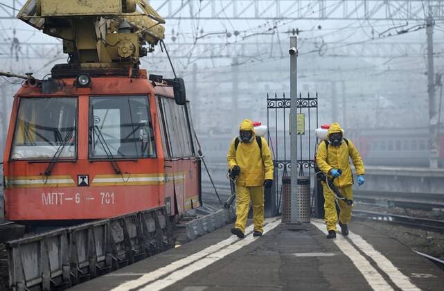 Russia Coronavirus Disinfection 6687187 02.11.2021 Employees of Russian Emergency Situations Ministry wearing protective gears disinfect a platform of the Kazansky railway station amid the coronavirus pandemic, in Moscow, Russia. Maksim Blinov Sputnik Moscow Russia  Copyright: xMaksimxBlinovx